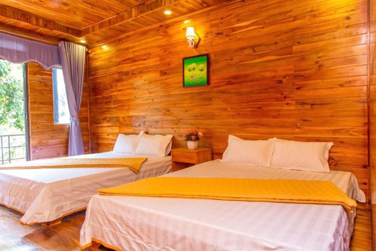 Các phòng nghỉ dưỡng của homestay Cô Tô này sử dụng phong cách tối giản nhưng vẫn cung cấp đầy đủ tiện nghi cần thiết (nguồn: booking.com)