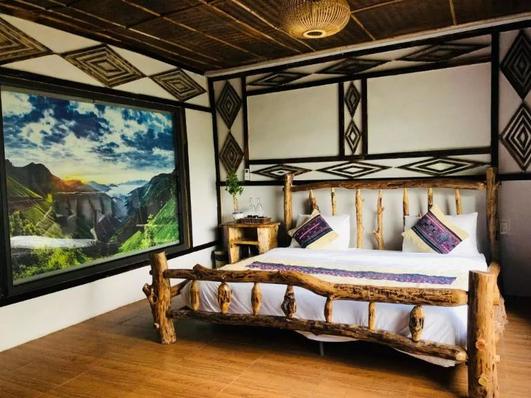 Phòng nghỉ tại O’Chau Boutique được thiết kế trang trí chủ đạo bằng đường vân gỗ xoan chất lượng.